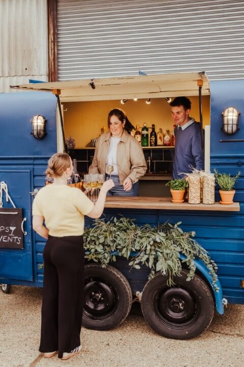 A client asking for a drink from the Tipsy Vintage Horse Box