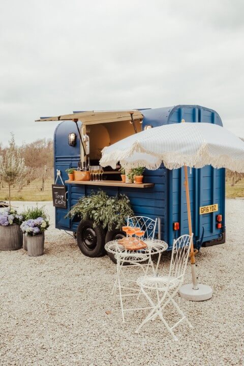 The Tipsy Events Vintage Horse Box on a summers day at the Cherry Barn